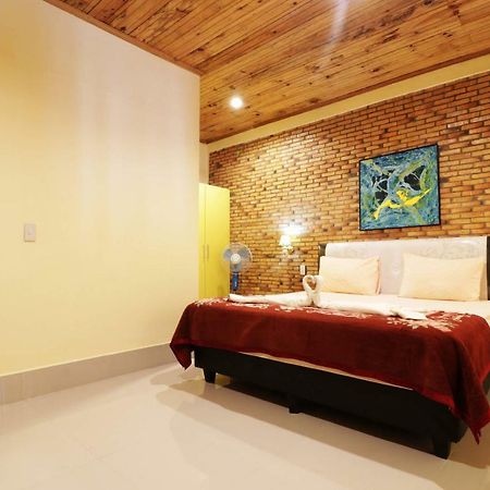 Tuk Tuk Timbul Bungalows Rum bild